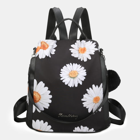 Mochila Antirroubo Impermeável para mulher (14.80L) | Mochila Convertível em mala com pompom e pega decorativa removível Margaridas