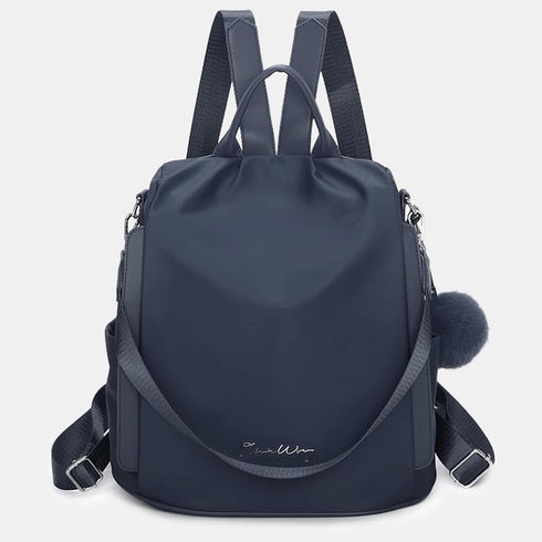 Mochila Antirroubo Impermeável para mulher (14.80L) | Mochila Conversível em mala de mão com pompão e alça removível de adorno Azul Marinho
