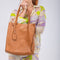 Mala tote de pele lisa de mulher castanha primavera Stella