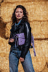 Bolso bandolera de piel lila Tamara