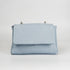 Bolso bandolera con solapa de piel azul celeste Carla primavera