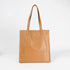 Mala tote de pele lisa de mulher castanha primavera Stella
